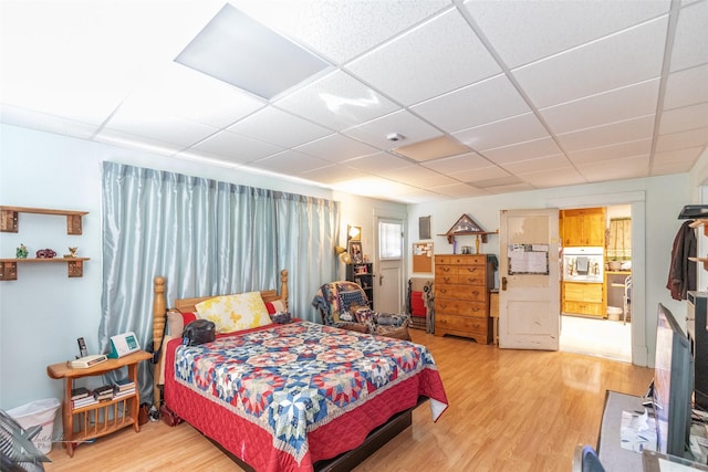 1541 S 9th St, Abilene, TX 79602 - bedroom with light wood finished floors and a paneled ceiling