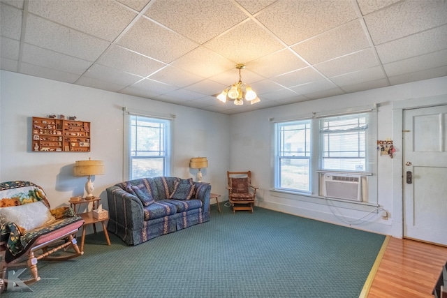 1541 S 9th St, Abilene, TX 79602 - living area with a paneled ceiling, cooling unit, healthy amount of natural light, and a chandelier