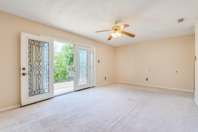 2816 Wateridge Ct, Grapevine, TX 76051 - carpeted empty room with ceiling fan, a textured ceiling, and baseboards