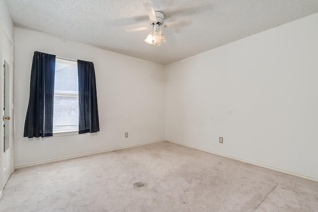 2816 Wateridge Ct, Grapevine, TX 76051 - carpeted spare room with a textured ceiling, a ceiling fan, and baseboards