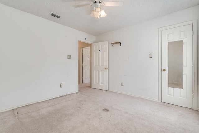 2816 Wateridge Ct, Grapevine, TX 76051 - carpeted empty room with a ceiling fan and a textured ceiling