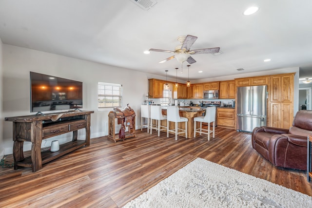 200 County Road 129, Stephenville, TX 76401 - living room with dark wood-style floors, recessed lighting, a ceiling fan, and baseboards