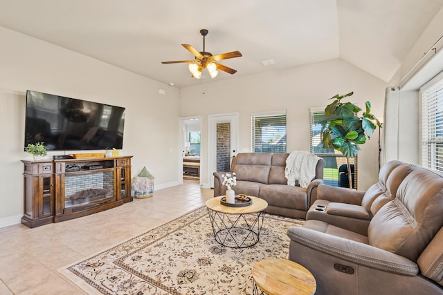 403 Woodbine Dr, Sherman, TX 75092 - living area with tile patterned floors, ceiling fan, baseboards, and lofted ceiling