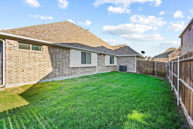 403 Woodbine Dr, Sherman, TX 75092 - rear view of property with brick siding, central air condition unit, and roof with shingles