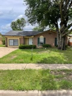 9925 Kittyhawk Ln, Dallas, TX 75217 - ranch-style house with a front yard