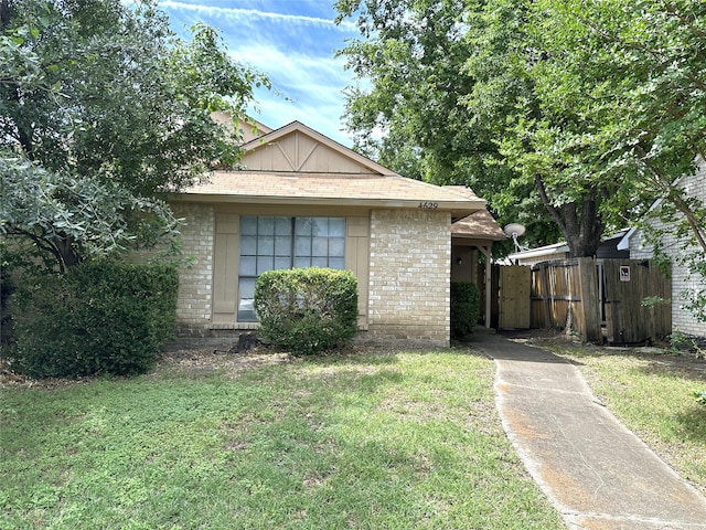 4629 Chapman St, The Colony, TX 75056 - bungalow-style home featuring brick siding