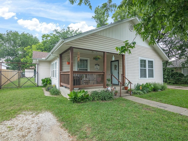 202 S Wood St, Cleburne, TX 76033 - bungalow-style home with a gate and covered porch