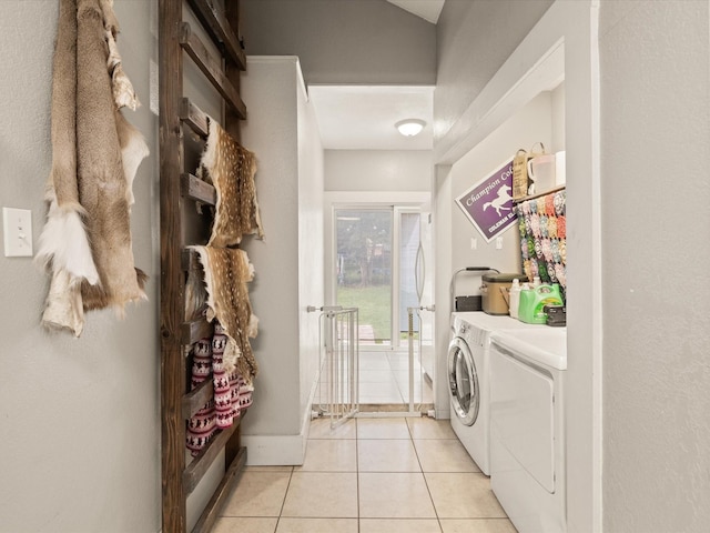 202 S Wood St, Cleburne, TX 76033 - laundry room with separate washer and dryer and light tile patterned flooring