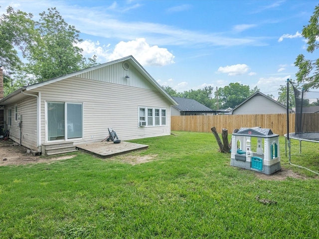 202 S Wood St, Cleburne, TX 76033 - back of property featuring a trampoline