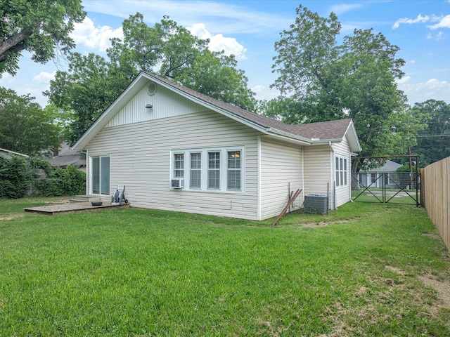 202 S Wood St, Cleburne, TX 76033 - rear view of house featuring a gate, central air condition unit, and roof with shingles