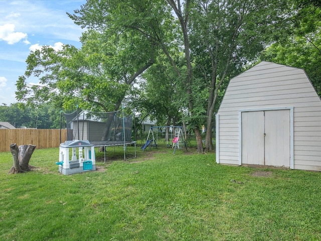 202 S Wood St, Cleburne, TX 76033 - view of yard with a trampoline and a playground