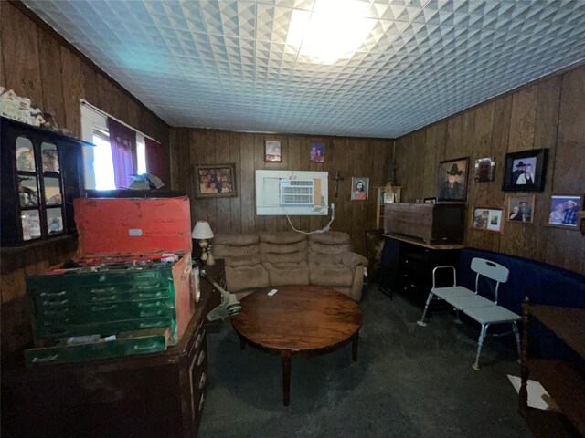 1008 Church St, Sulphur Springs, TX 75482 - living area with wood walls, an AC wall unit, and carpet
