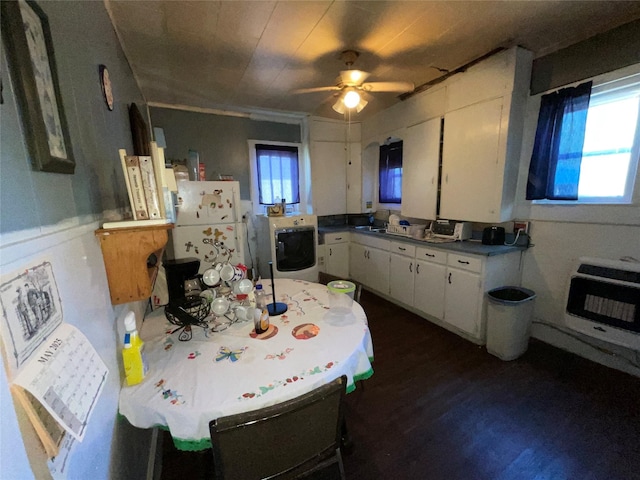 1008 Church St, Sulphur Springs, TX 75482 - kitchen with heating unit, washer / clothes dryer, white cabinets, freestanding refrigerator, and ceiling fan