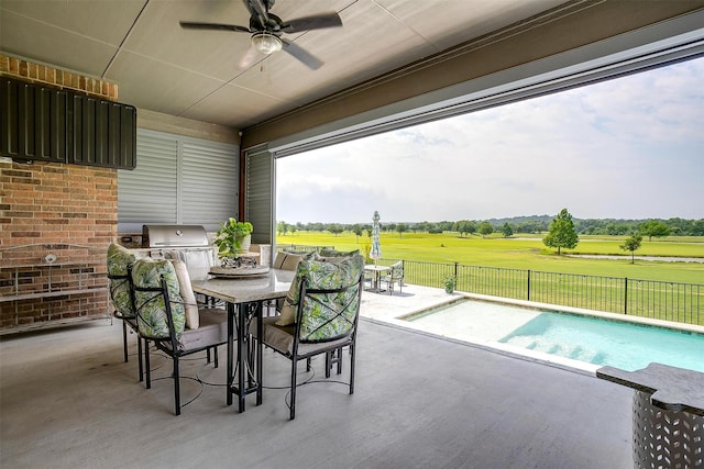 1305 Crown Valley Dr, Weatherford, TX 76087 - view of patio / terrace with exterior kitchen, ceiling fan, and outdoor dining area