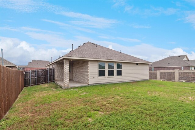 448 Buckeye Ave, Princeton, TX 75407 - rear view of house with a patio and a shingled roof