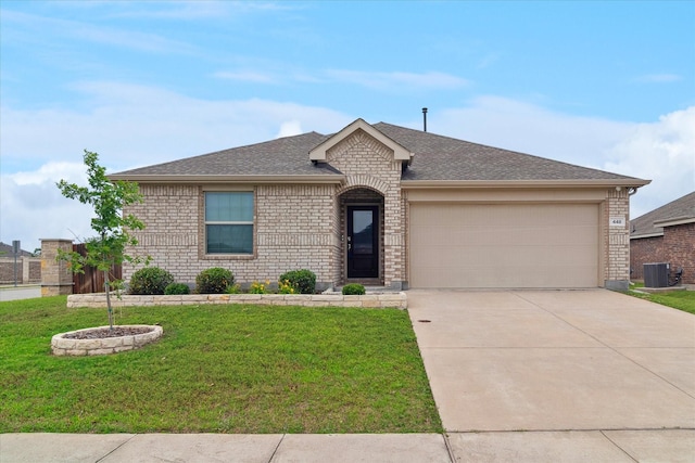 448 Buckeye Ave, Princeton, TX 75407 - ranch-style home featuring brick siding, cooling unit, driveway, and a front yard