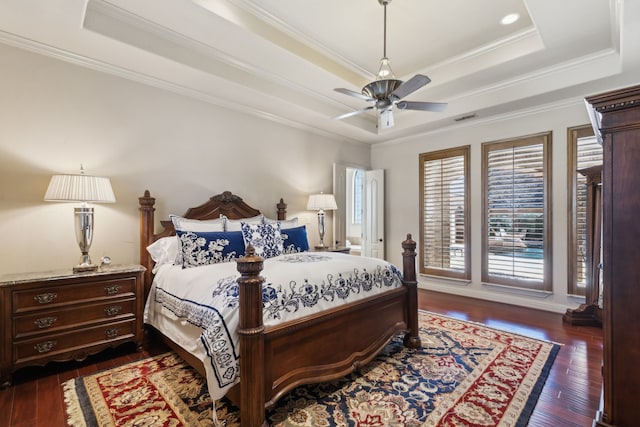 705 Love Henry Ct, Southlake, TX 76092 - bedroom with a raised ceiling, dark wood finished floors, ornamental molding, and ceiling fan