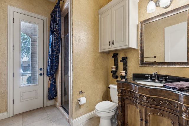 705 Love Henry Ct, Southlake, TX 76092 - bathroom featuring tile patterned flooring, toilet, a shower stall, vanity, and baseboards
