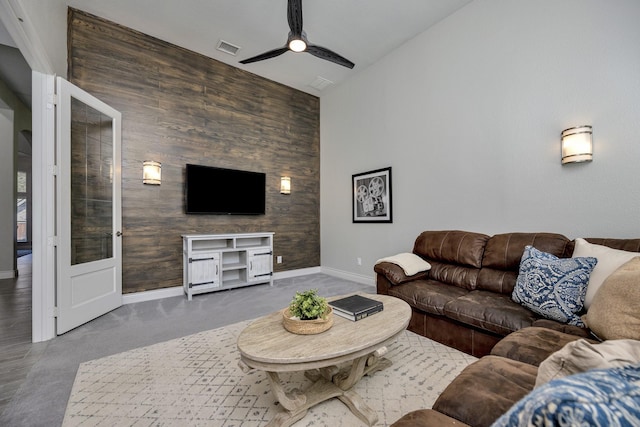1008 Myers Park Trl, Roanoke, TX 76262 - living area with baseboards, a ceiling fan, carpet flooring, and vaulted ceiling