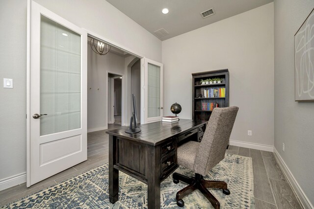1008 Myers Park Trl, Roanoke, TX 76262 - office area with arched walkways, baseboards, and recessed lighting