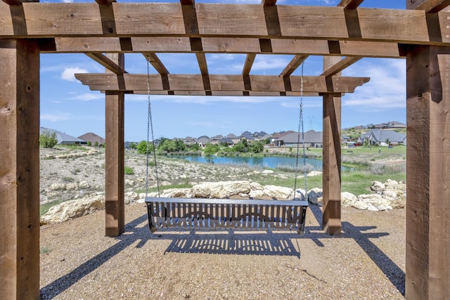 1008 Myers Park Trl, Roanoke, TX 76262 - view of patio / terrace featuring a water view, a residential view, and a pergola