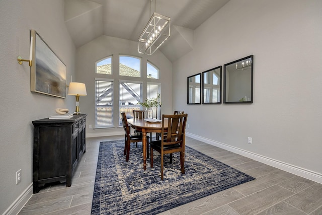 1008 Myers Park Trl, Roanoke, TX 76262 - dining space with lofted ceiling, wood finished floors, and baseboards