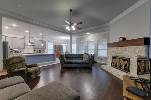 7816 Wheatland Ct, Godley, TX 76044 - living room featuring a chandelier, ceiling fan, plenty of natural light, dark wood finished floors, and crown molding