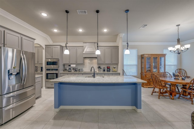 7816 Wheatland Ct, Godley, TX 76044 - kitchen with stainless steel appliances, gray cabinets, crown molding, premium range hood, and recessed lighting