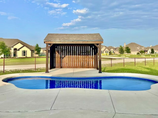 7816 Wheatland Ct, Godley, TX 76044 - view of swimming pool with a residential view and a patio area