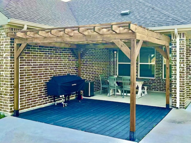 7816 Wheatland Ct, Godley, TX 76044 - wooden deck featuring a pergola and outdoor dining space