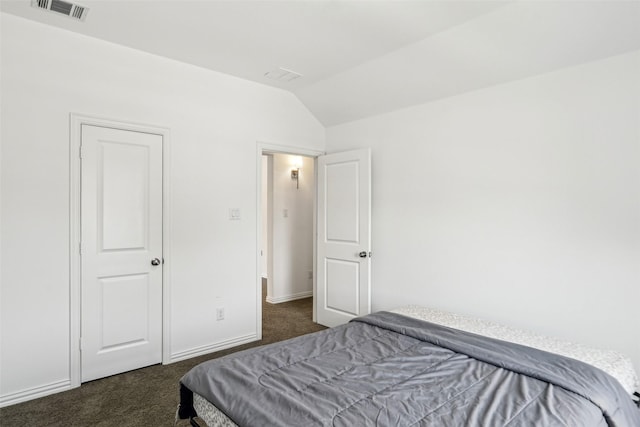 616 Evergreen Rd, Little Elm, TX 76227 - bedroom featuring dark colored carpet, lofted ceiling, and baseboards