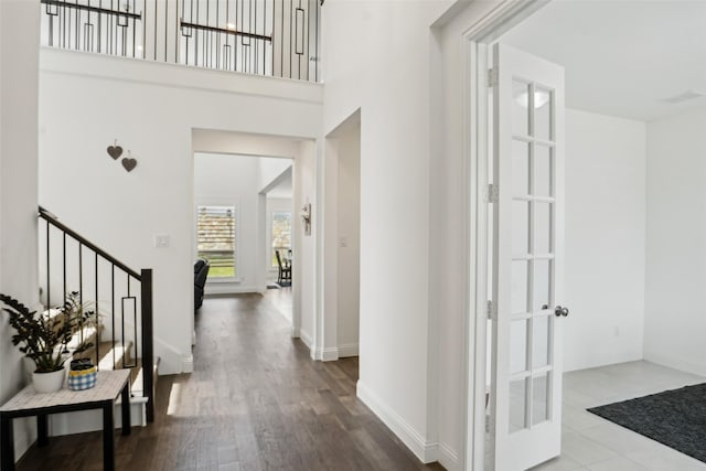 616 Evergreen Rd, Little Elm, TX 76227 - foyer entrance featuring baseboards, wood finished floors, and stairs