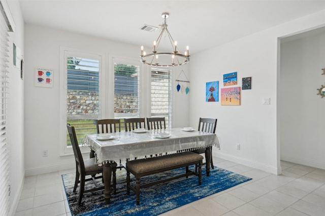 616 Evergreen Rd, Little Elm, TX 76227 - dining space with a chandelier, light tile patterned floors, and baseboards