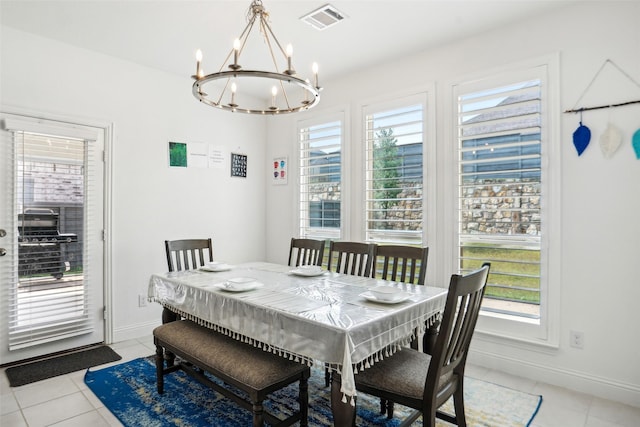 616 Evergreen Rd, Little Elm, TX 76227 - dining space with a chandelier, light tile patterned floors, and baseboards