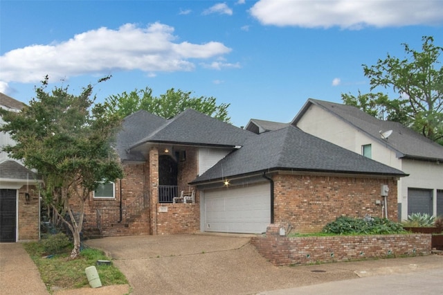 9131 Valley Chapel Ln, Dallas, TX 75220 - view of front facade featuring an attached garage, brick siding, driveway, and roof with shingles