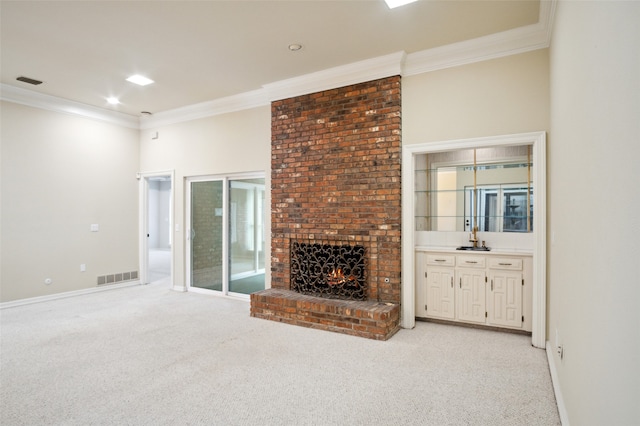 9131 Valley Chapel Ln, Dallas, TX 75220 - unfurnished living room featuring crown molding, light colored carpet, a brick fireplace, and baseboards