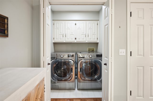 9131 Valley Chapel Ln, Dallas, TX 75220 - laundry room with washing machine and dryer and cabinet space
