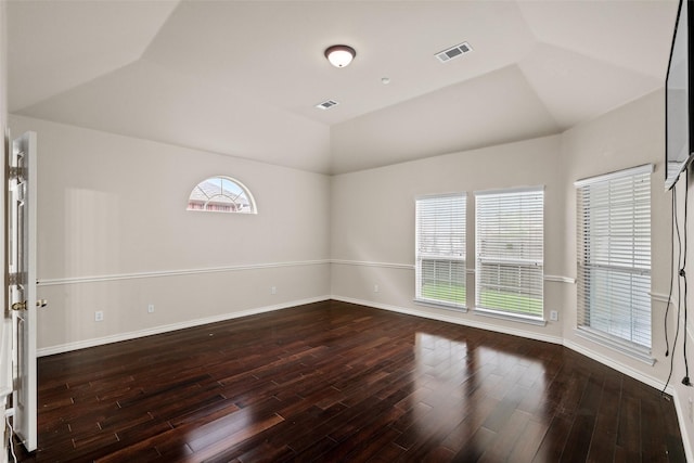 1117 Ruby St, Plano, TX 75094 - spare room featuring hardwood / wood-style floors, baseboards, and lofted ceiling