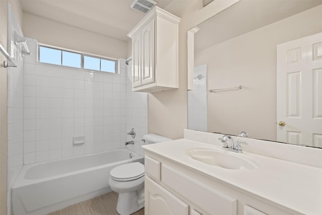 1117 Ruby St, Plano, TX 75094 - bathroom featuring toilet, washtub / shower combination, and vanity