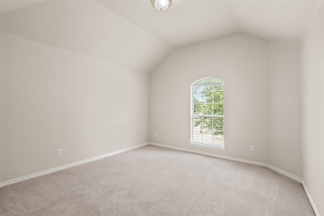 1117 Ruby St, Plano, TX 75094 - additional living space featuring light colored carpet, lofted ceiling, and baseboards