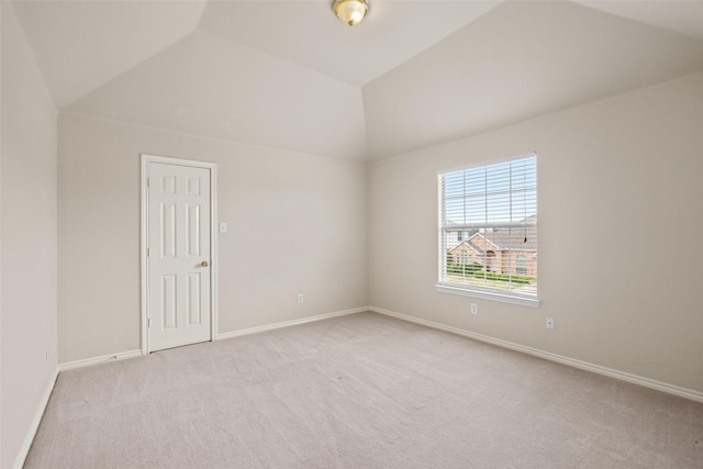 1117 Ruby St, Plano, TX 75094 - empty room with vaulted ceiling, light carpet, and baseboards