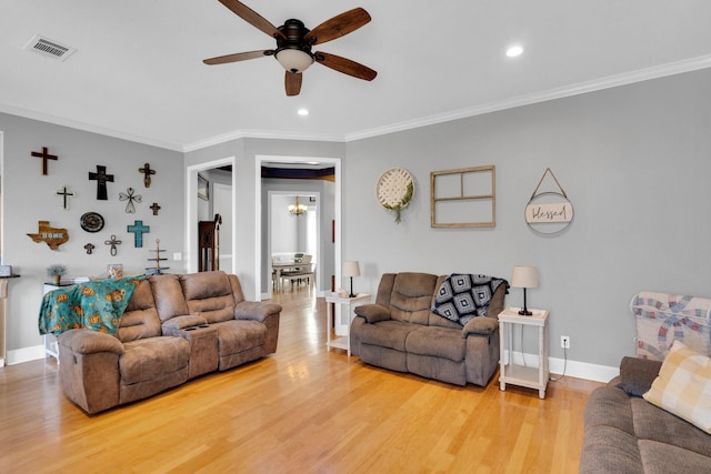 1107 Shoreview Dr, Ennis, TX 75119 - living area featuring ceiling fan, ornamental molding, light wood-style flooring, baseboards, and recessed lighting