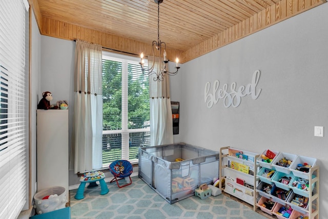1107 Shoreview Dr, Ennis, TX 75119 - recreation room featuring wood ceiling, a chandelier, and baseboards
