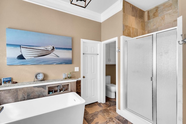1107 Shoreview Dr, Ennis, TX 75119 - bathroom featuring crown molding, a shower stall, a soaking tub, and toilet