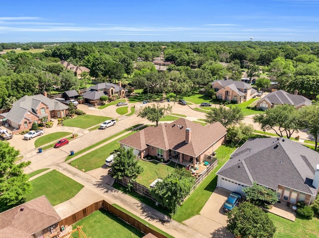 1107 Shoreview Dr, Ennis, TX 75119 - aerial perspective of suburban area featuring a heavily wooded area