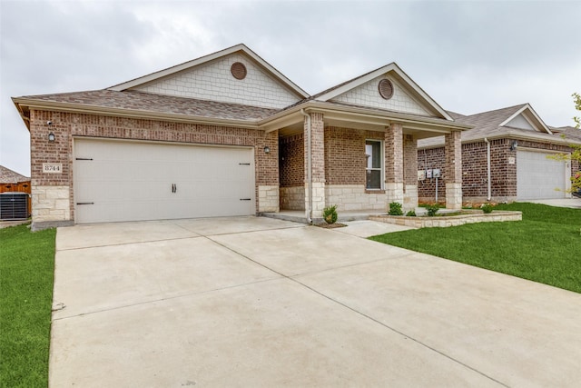 8744 Sleepy Daisy Dr, Fort Worth, TX 76131 - view of front of home featuring brick siding, driveway, stone siding, a garage, and central air condition unit