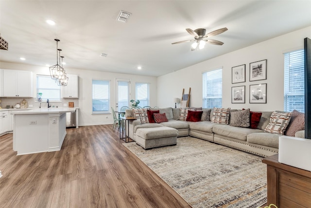 8744 Sleepy Daisy Dr, Fort Worth, TX 76131 - living room featuring light wood finished floors, ceiling fan, recessed lighting, and baseboards