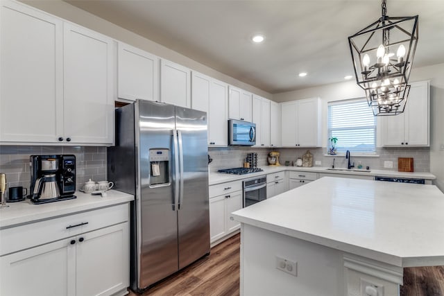 8744 Sleepy Daisy Dr, Fort Worth, TX 76131 - kitchen featuring stainless steel appliances, a sink, tasteful backsplash, light countertops, and recessed lighting