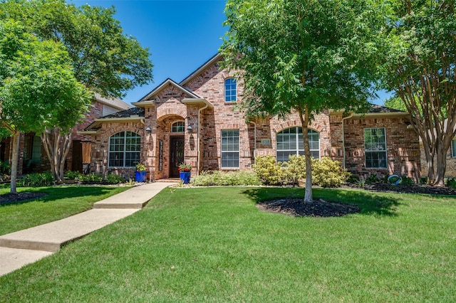 1719 Wheatberry Ln, Allen, TX 75002 - traditional home with a front lawn and brick siding
