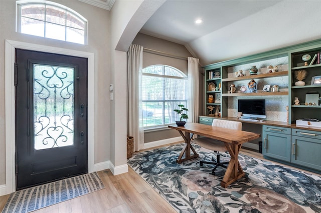 1719 Wheatberry Ln, Allen, TX 75002 - entryway with light wood-style flooring, baseboards, lofted ceiling, and arched walkways